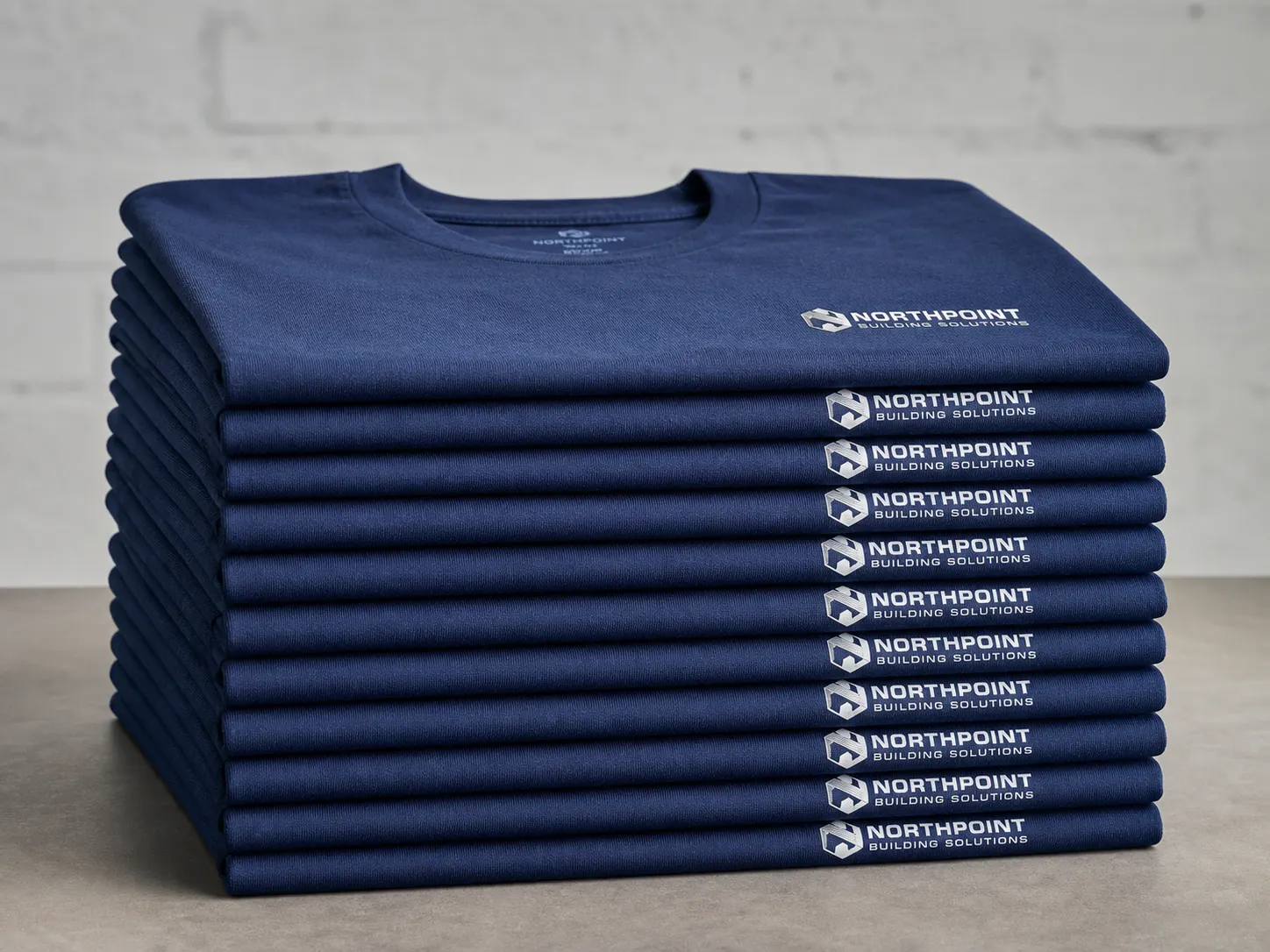 Tirada de camisetas idénticas con serigrafía para empresa Valencia